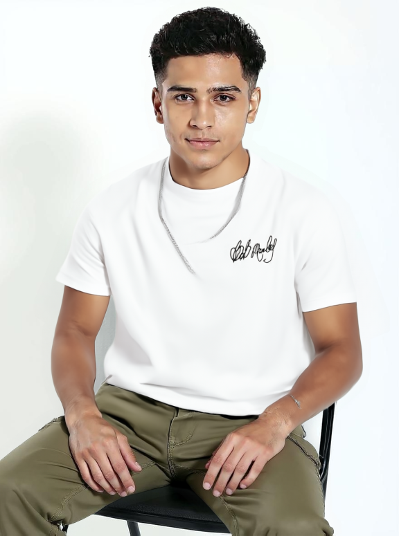 Model wearing white kurta elegant pose